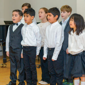 Young group of children singing in a chorus
