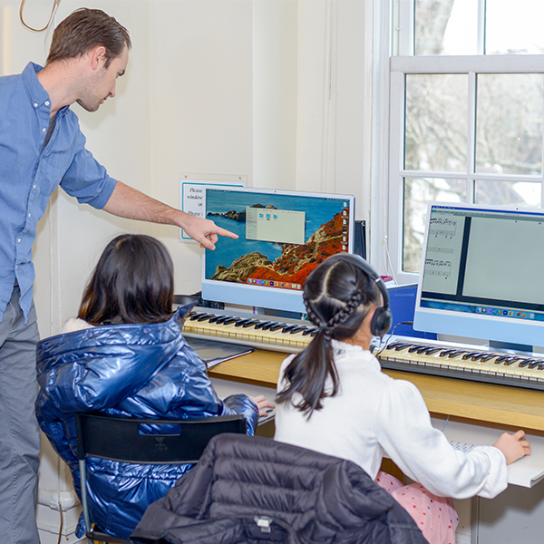 Students and teacher in the music technology lab