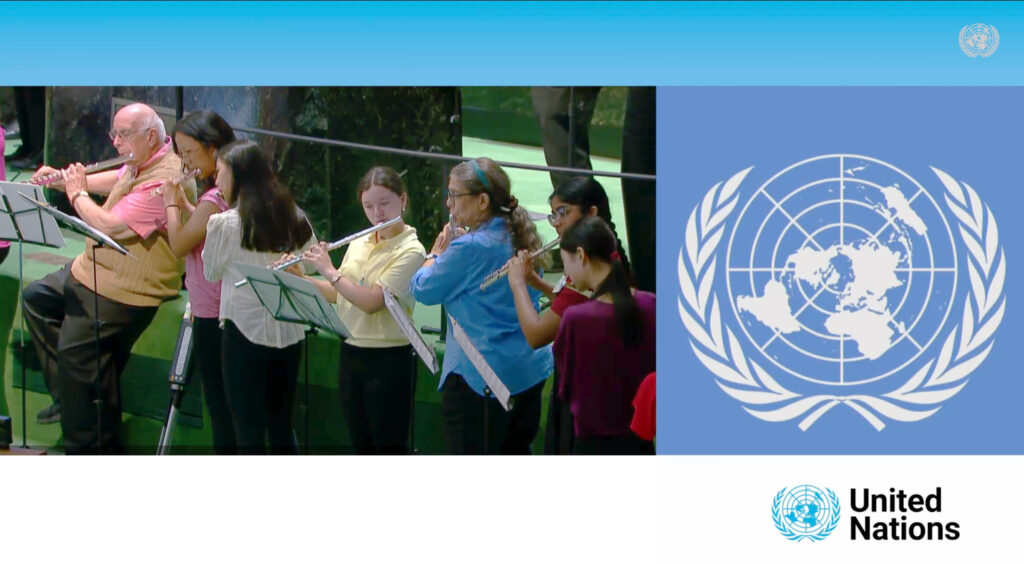 Intergenerational flute students playing at the UN