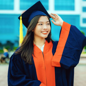 Girl in blue cap and gown