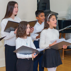 Young students singing in a chorus