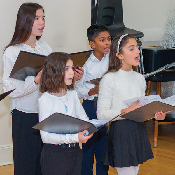 Young students singing in a chorus