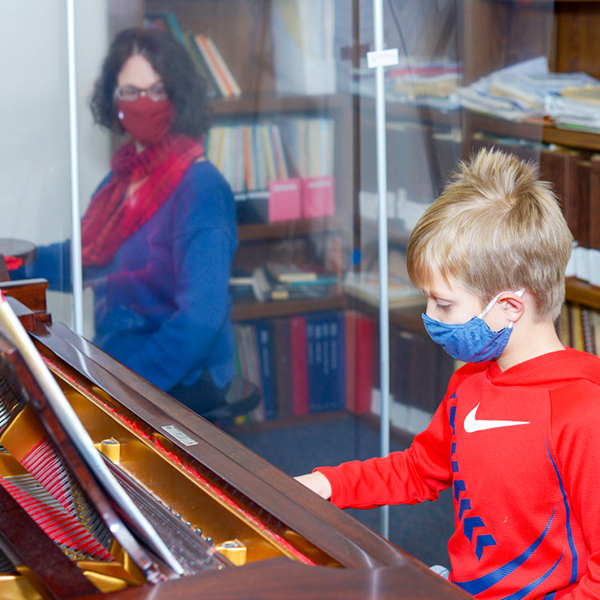 Piano lesson with Covid-safety precautions in place