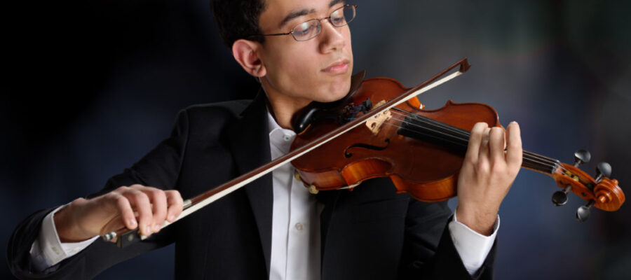 Teenager playing the violin