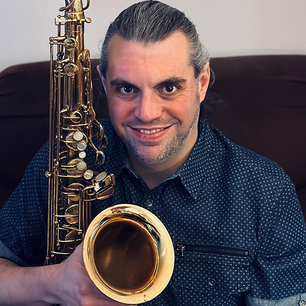 Faculty Member Tim Veder with Saxophone